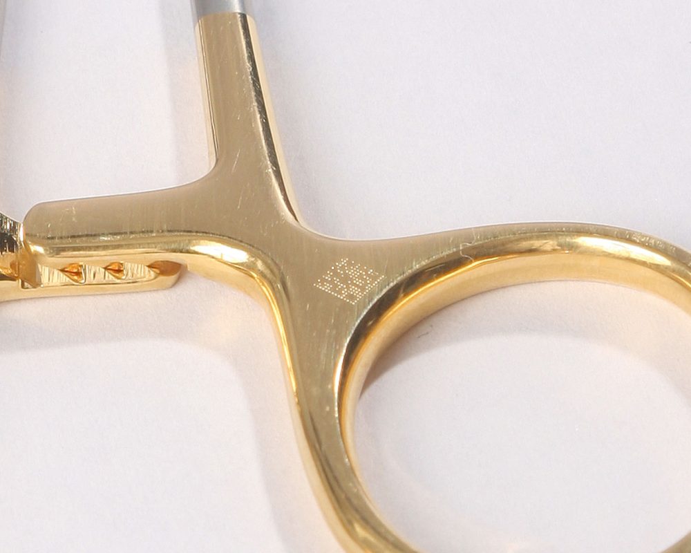 sector-industria-medica-grabado-pinza-medico-sanitario.img